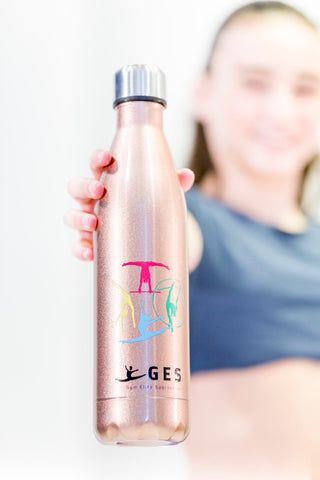 Give your water cooler a fresh and sustainable upgrade with the rose gold Gymnastics Passion water bottle, embellished with a gymnastics stamp.  Made using premium food grade, non-leaching stainless steel inox with a BPA free leak proof silicone seal to keep your drink chilled or hot for prolonged periods.  These BPA-free water bottles are perfect for any activity. Hydration never looked so good!